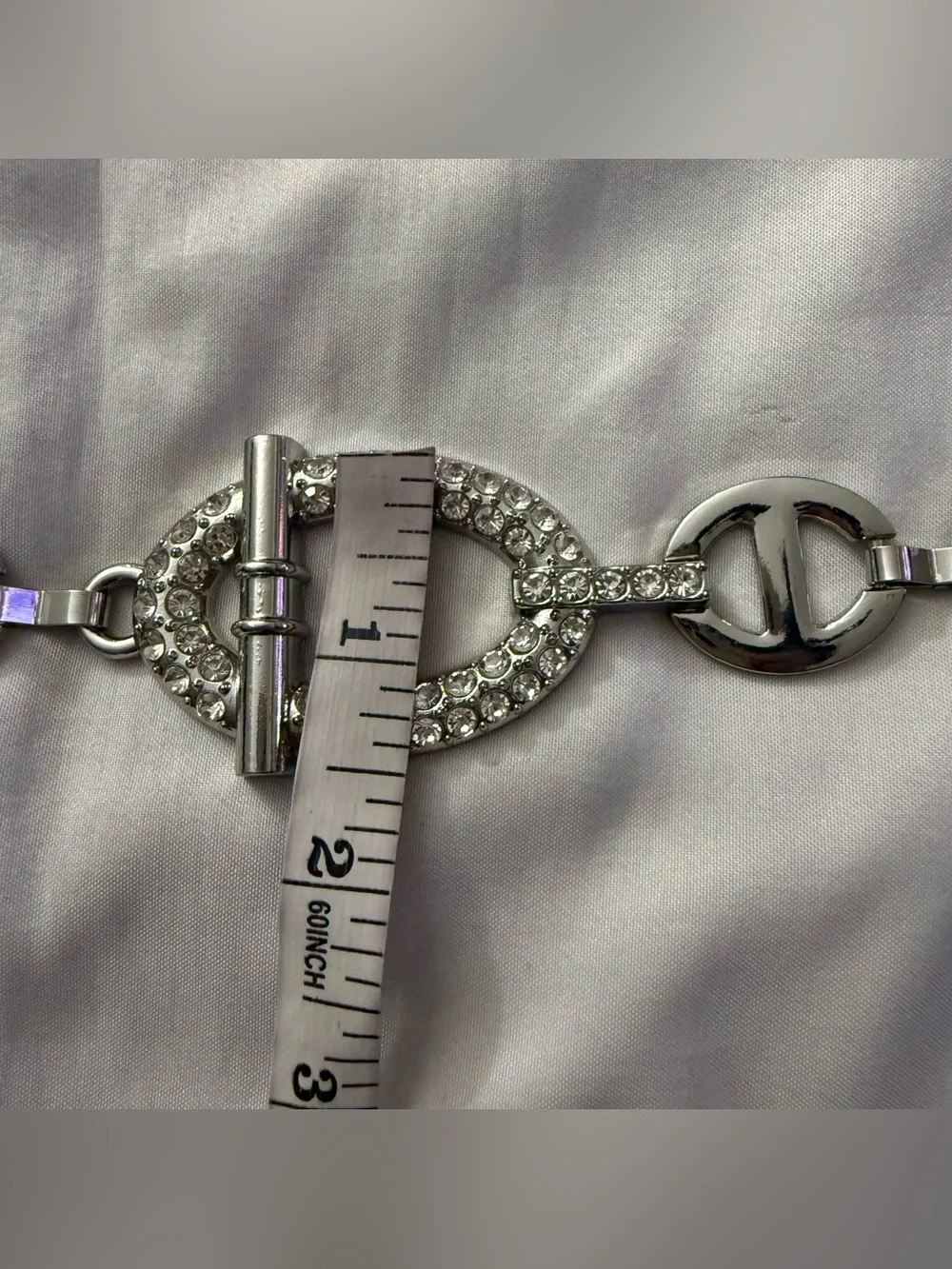 Silver tone metal chain belt with rhinestone details